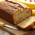 Freshly baked banana bread sliced and ready to serve